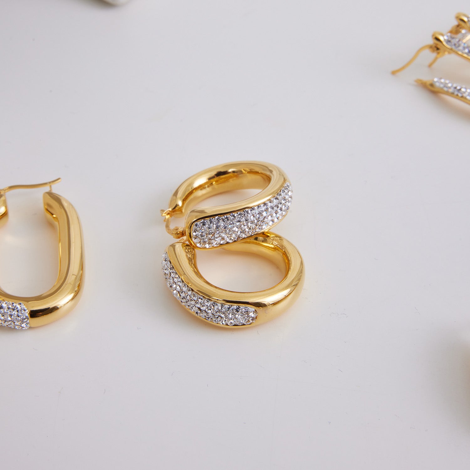 18K gold over silver chunky hoop earrings set with micro pave crystals