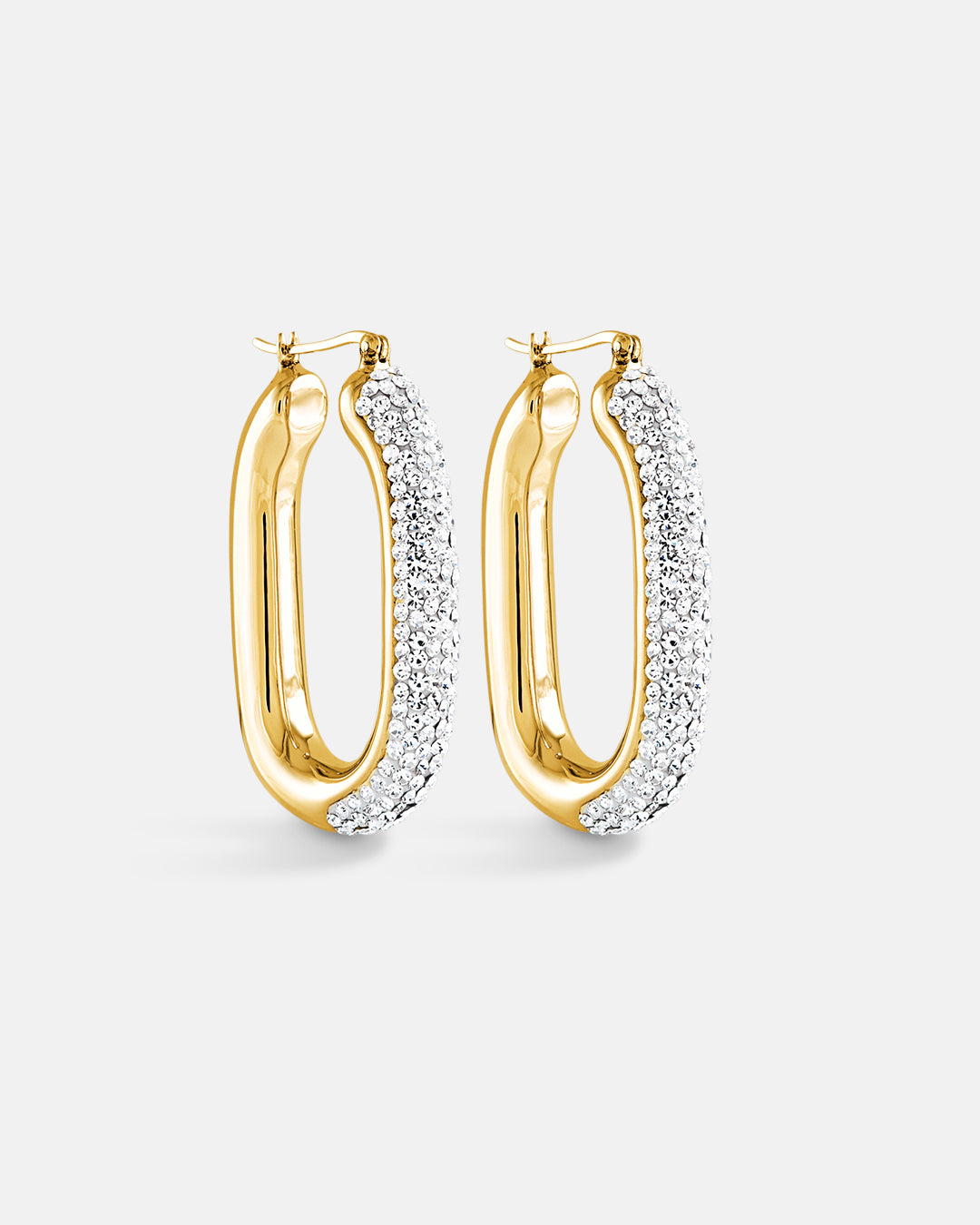 This is the product picture of elegant hoop earrings with micro pavé crystals plated in gold in sterling silver material