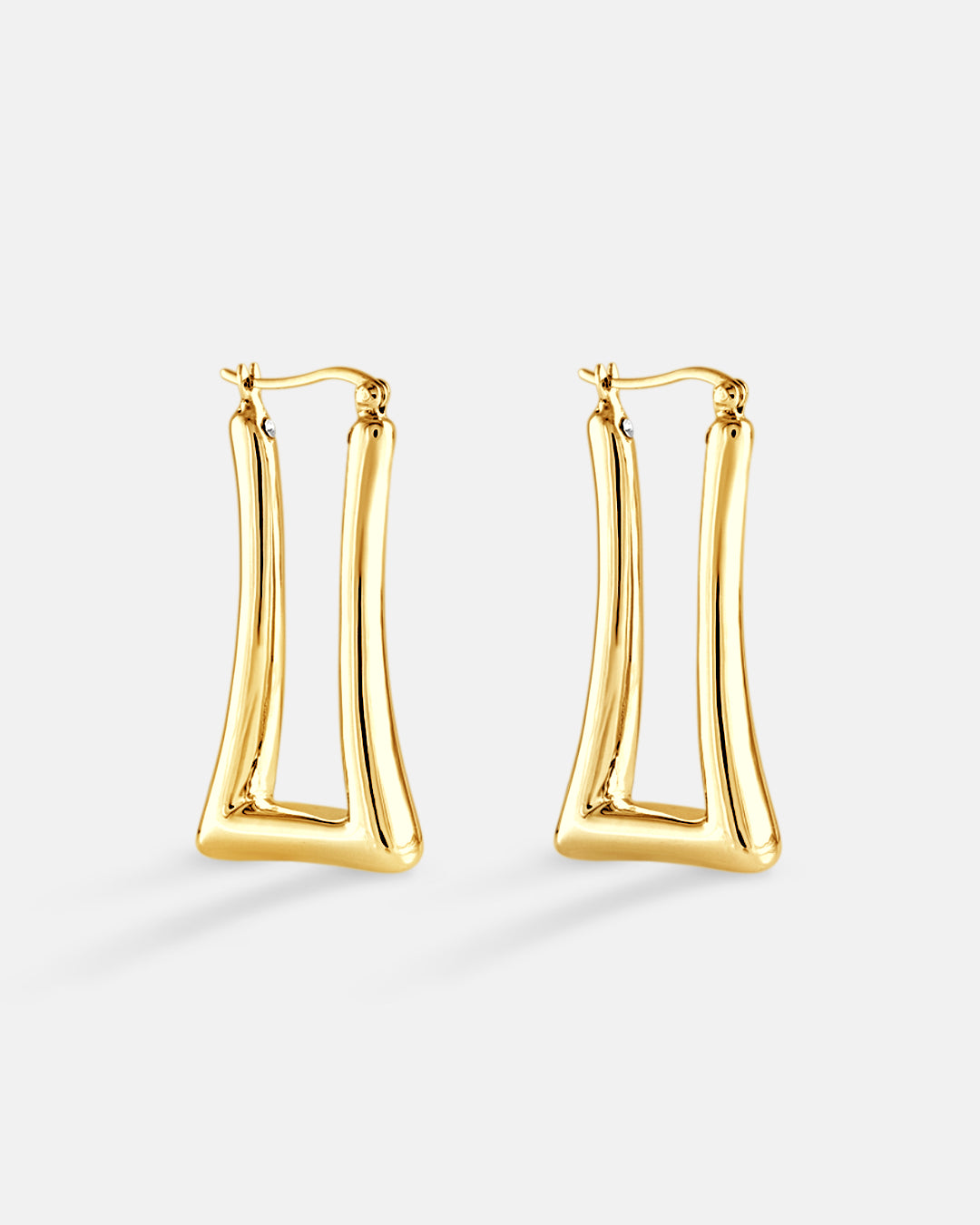 This is the product picture of elongated rectangular shape hoop earrings plated in gold in sterling silver material