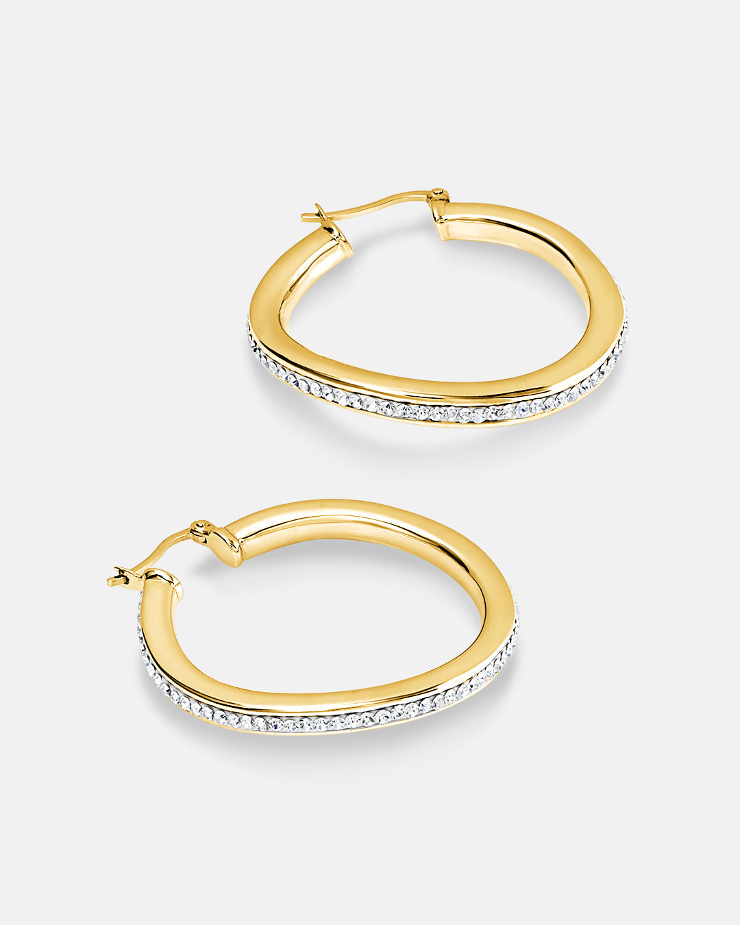 This is the product picture of a slight free form twist hoop earrings with micro pavé crystals plated in gold in sterling silver material