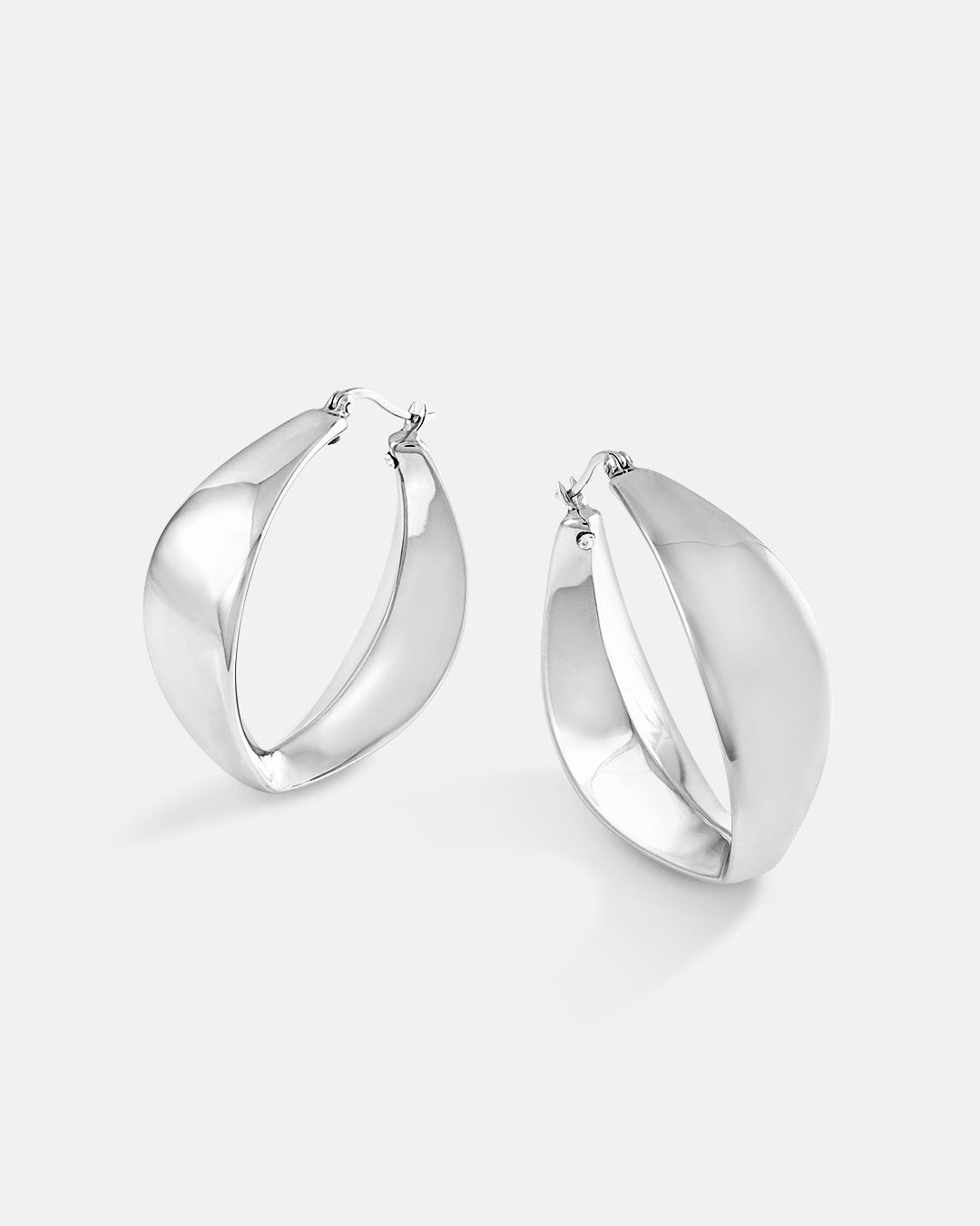 This is the product picture of chunky hoop earrings plated in white gold in sterling silver material