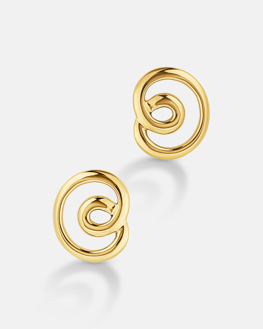 This is the product picture of twisted wire design hoop earrings plated in gold in sterling silver material