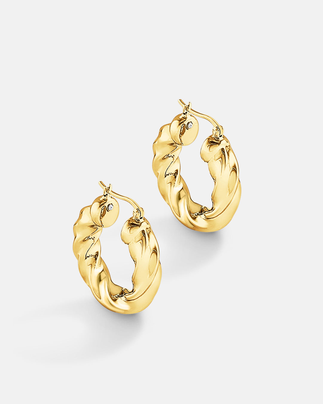 This is the product picture of modern twisted chunky hoop earrings plated in gold in sterling silver material